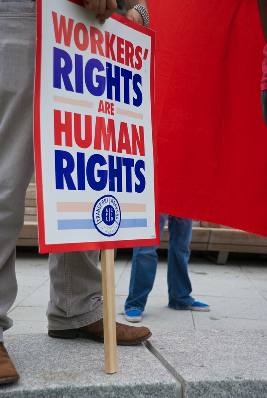Photos of workers rights are human rights banner